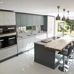 A modern family kitchen with flat doored cabinets