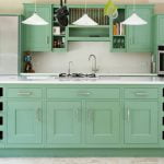 A traditional in-frame kitchen in a vibrant green colour