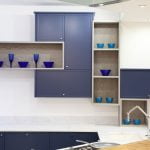 A quirky design using lay-on kitchen cabinets
