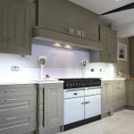 A contemporary raised and fielded style kitchen in warm grey