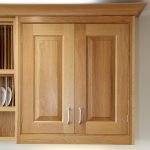 Raised and fielded kitchen cabinet doors in natural wood