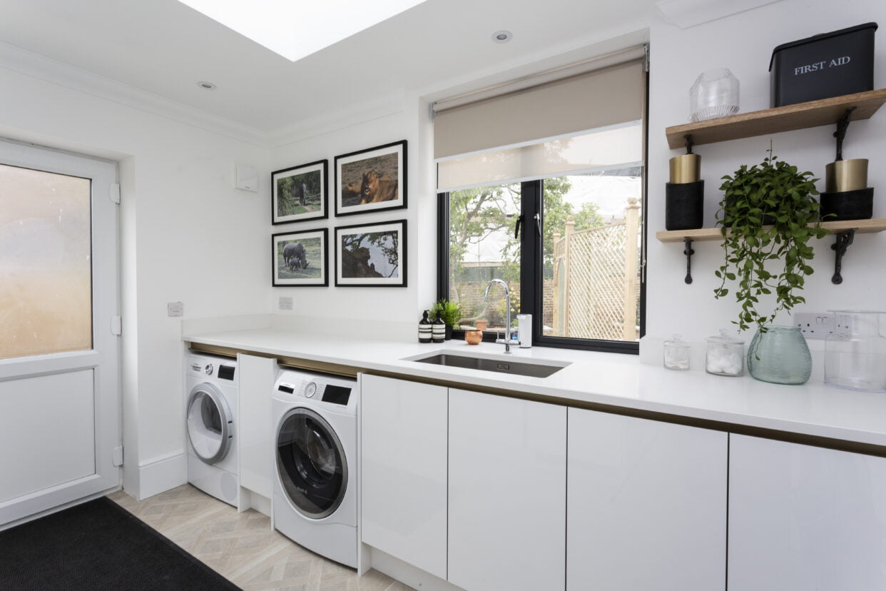Utility room with appliances and storage
