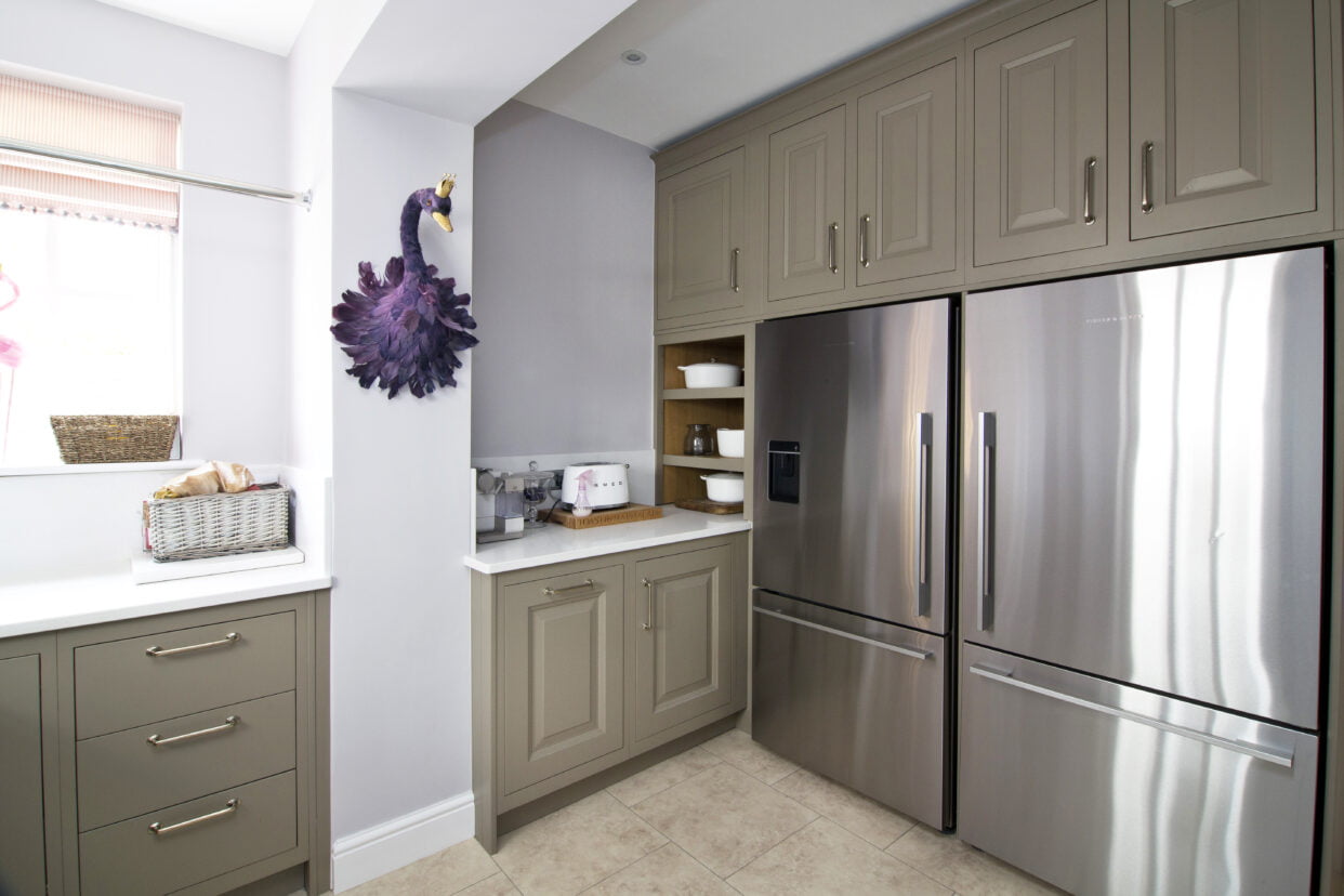 Utility room with two large Fisher & Paykel fridges