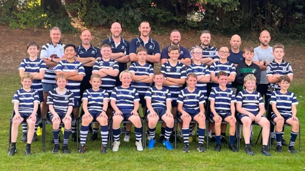 The 2025/26 U14 team and their coaches